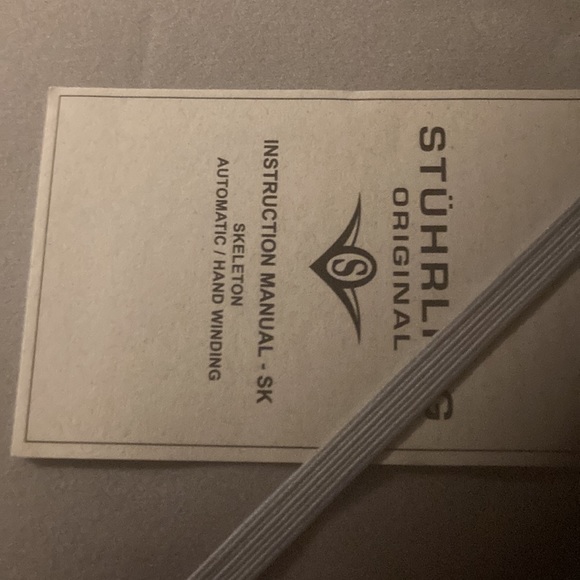 Gorgeous Stuhrling woman’s skeleton watch with several colored bands. - Picture 8 of 9